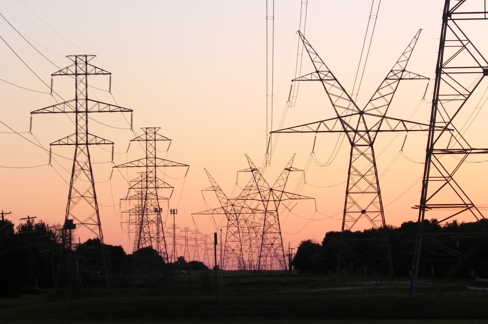 Transmission lines sunset photo.