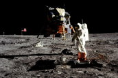Apollo 11 lunar landing, July 20, 1969, with astronaut Buzz Aldrin working with seismic equipment.