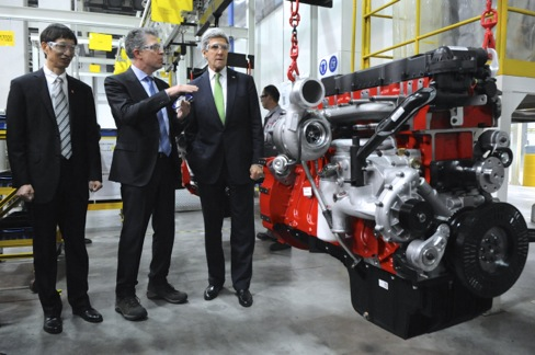 Obama's Secretary of State John Kerry (green tie), who signed the Paris Climate Agreement, touring a Chinese auto factory. China is one of the top emitters of greenhouse gases. Photo is by the US State Department so is in the public domain. Photo of Secretary Kerry touring Chinese auto factory.