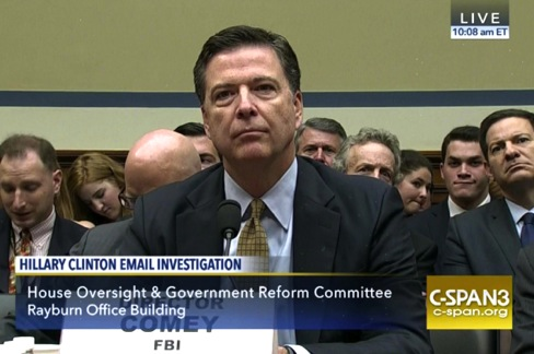 Former FBI Director Comey testifying. C-SPAN so in the public domain. Photo of former FBI Director Comey testifying.